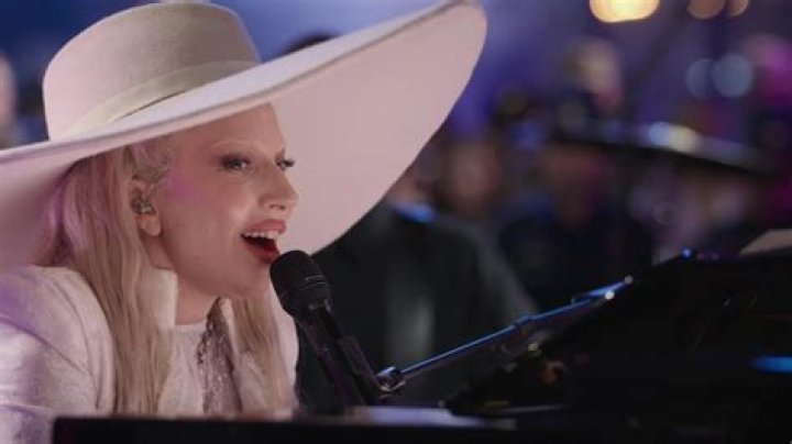 Makeup-Free Lady Gaga Sings 'Hold My Hand' During Last-Minute Oscars Performance ·